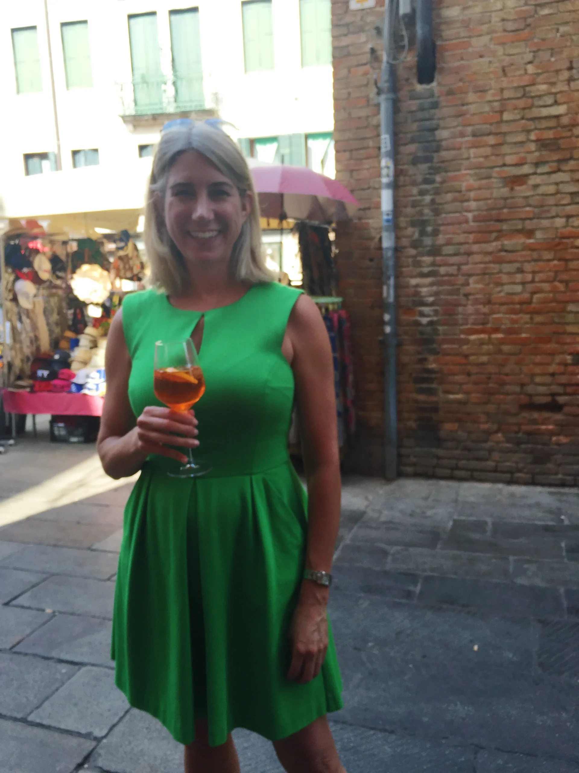  Sipping the ubiquitous Aperol Spritz in the Rialto Market in Venice, Italy, on a cooking trip with   Stirred Travel   — 2015 